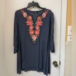 Boutique tunic with floral embroidery detailing